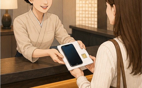 Travel SIM and smartphone package delivered to a hotel reception desk